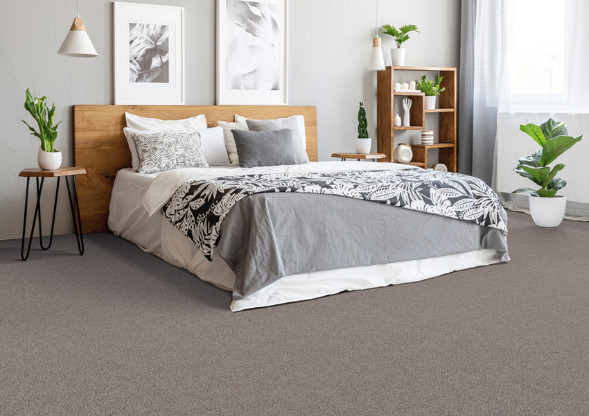 grey carpet installation in bedroom